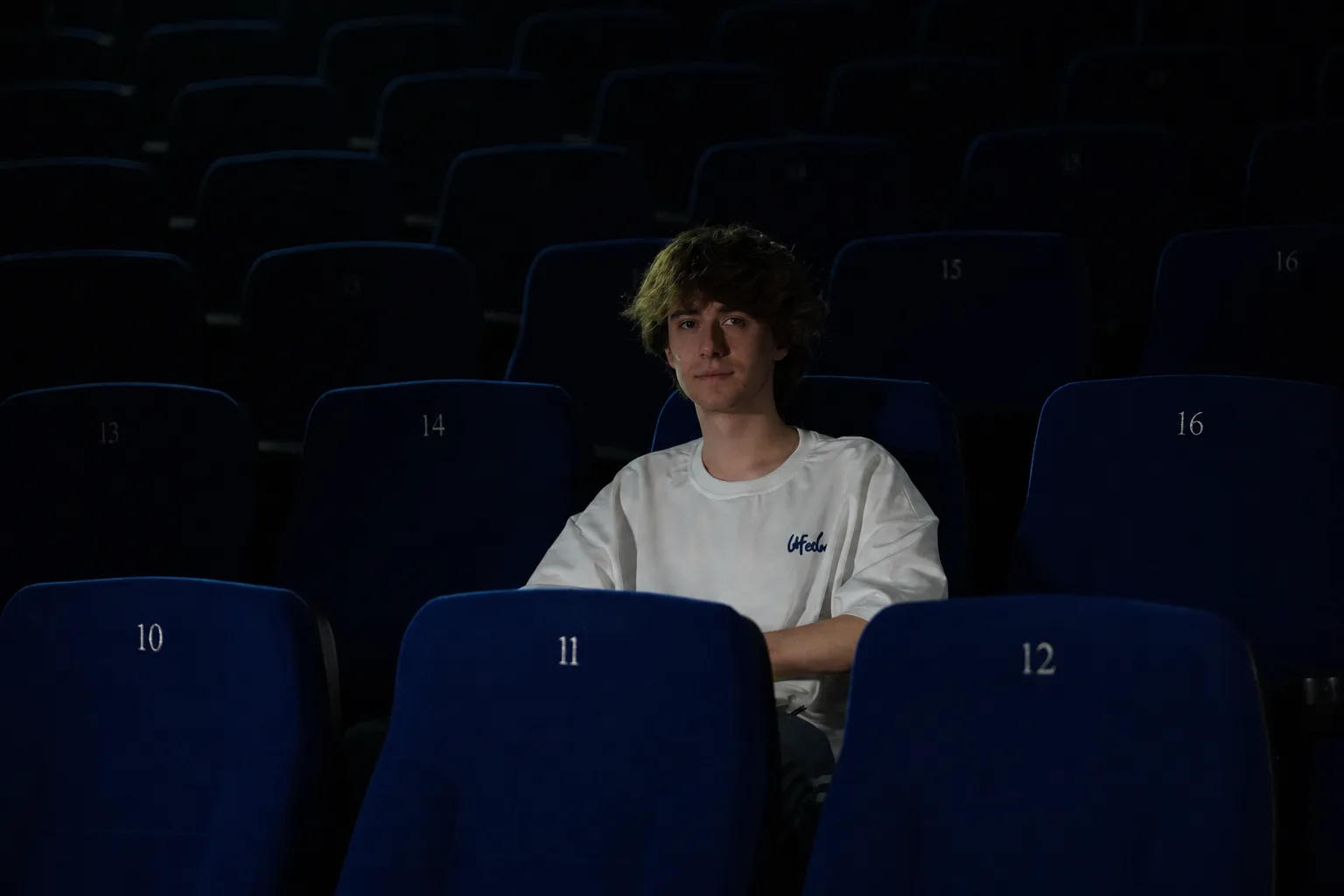 Official PoPaCi portrait, shot in an empty screening room